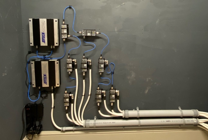 Custom residential DAS deployment in upstate NY. Balanced RF power distribution at headend allows for single home-run cables to each service antenna.